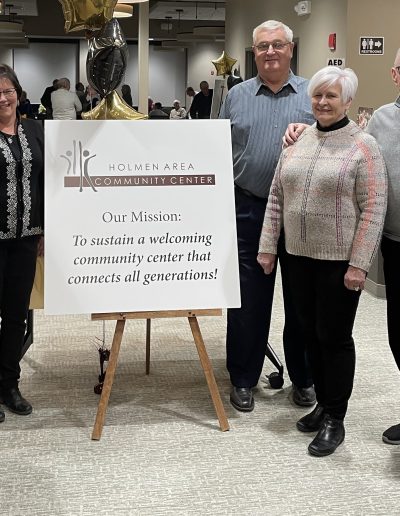 Group Photo for Donor Appreciation with Sign