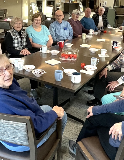 A Picture of the Walking Group with Coffe and Muffins